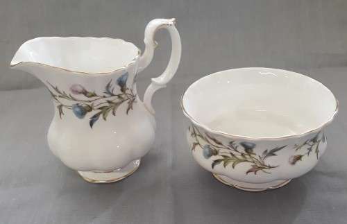 A ROYAL ALBERT BRIGADOON MILK JUG AND SUGAR BOWL