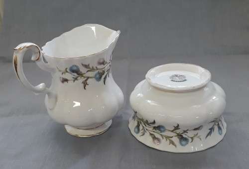 A ROYAL ALBERT BRIGADOON MILK JUG AND SUGAR BOWL