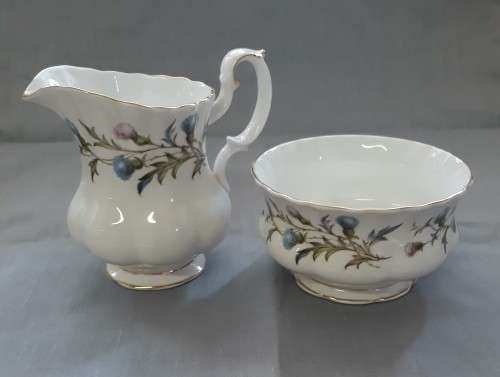 A ROYAL ALBERT BRIGADOON MILK JUG AND SUGAR BOWL