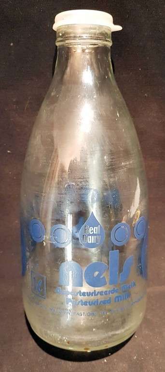 Nels Milk Bottle - With original cap - Low Price - Bid Now!!!