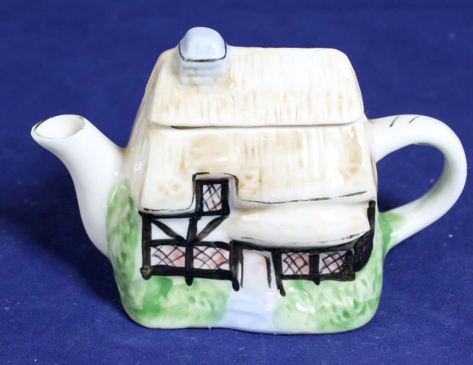 Small character tea pot