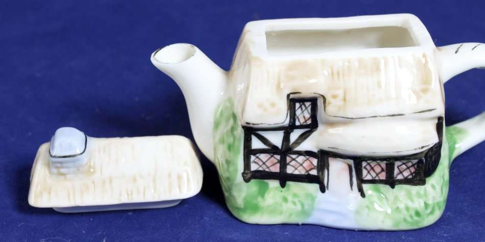 Small character tea pot