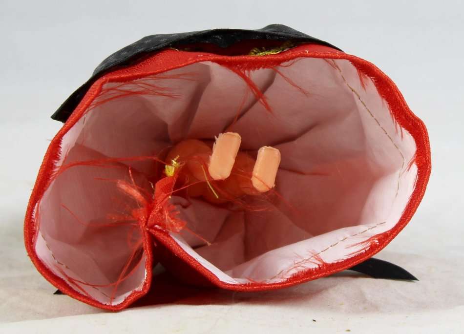 Girl with braids in traditional dress doll