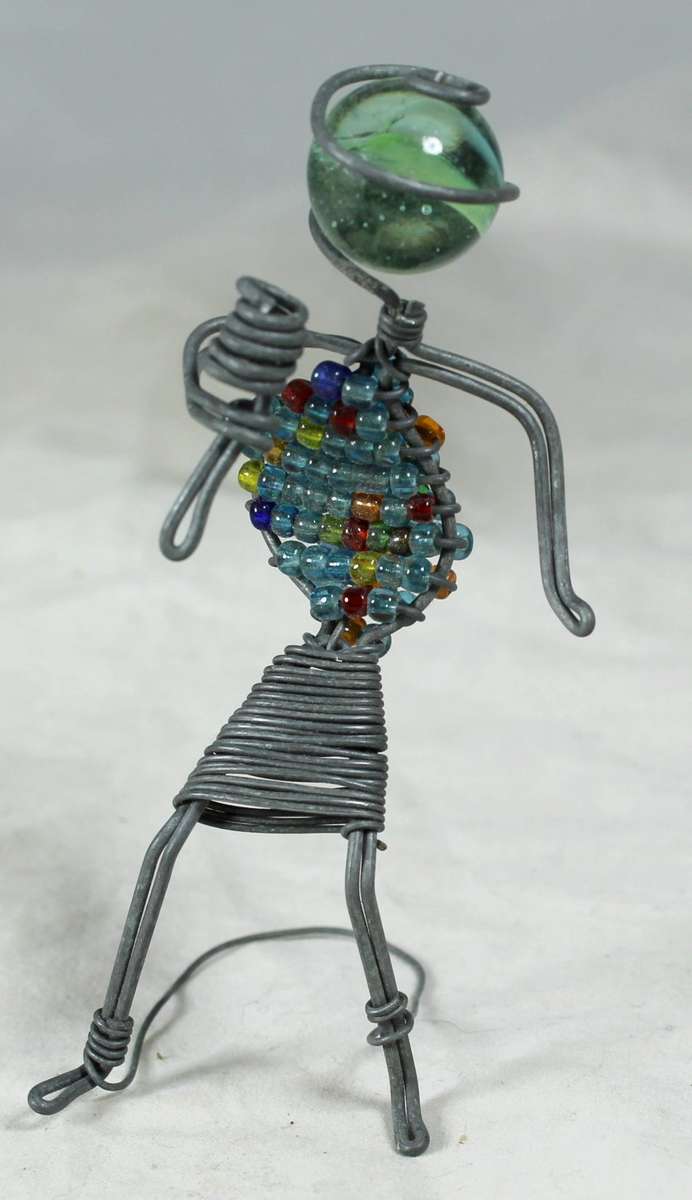 Miniature beaded wire figurine with microphone