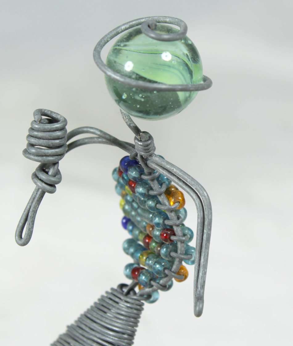 Miniature beaded wire figurine with microphone