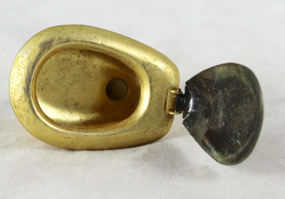 Miniature brass toilet