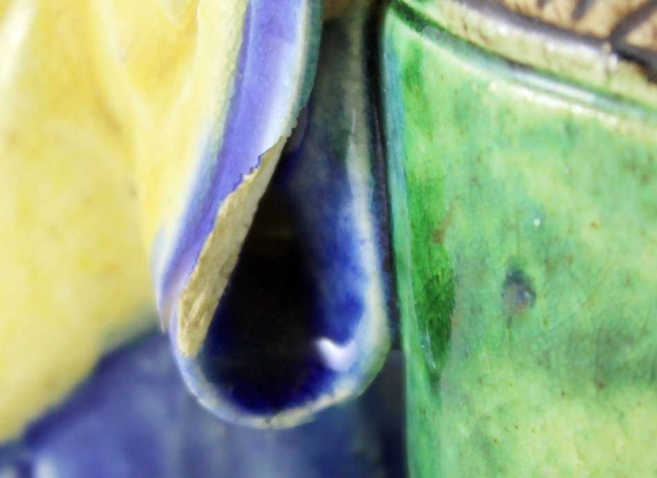 Mud man with big green pot