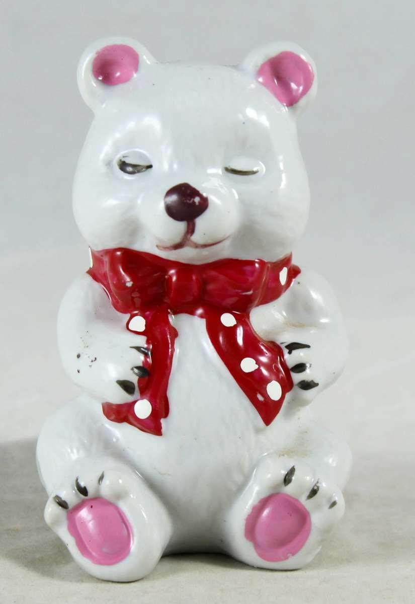 White bear with red bow