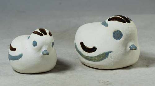 Blue and brown bird figures