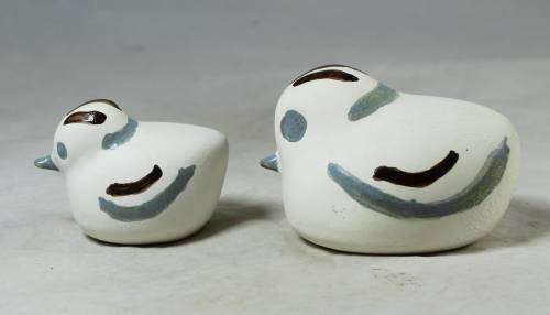 Blue and brown bird figures