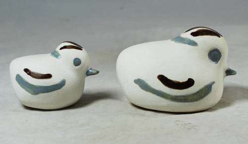 Blue and brown bird figures