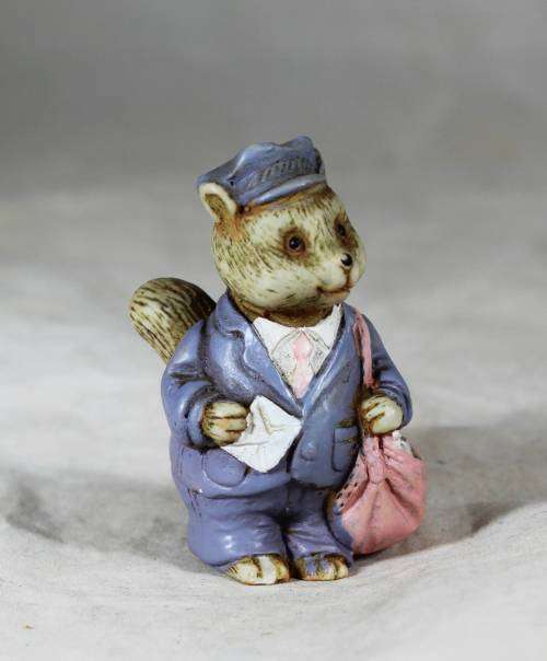 Small rabbit figure - postman