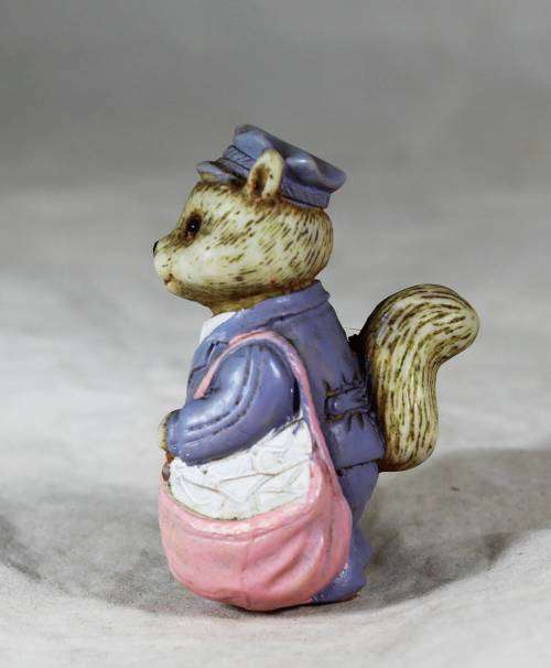 Small rabbit figure - postman