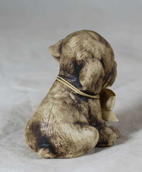 Small figure - sad puppy