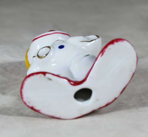 Smiling clown figurine