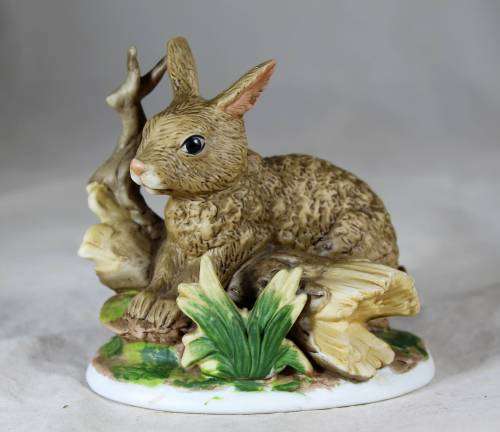 Rabbit on a log figurine - Bid Now!!
