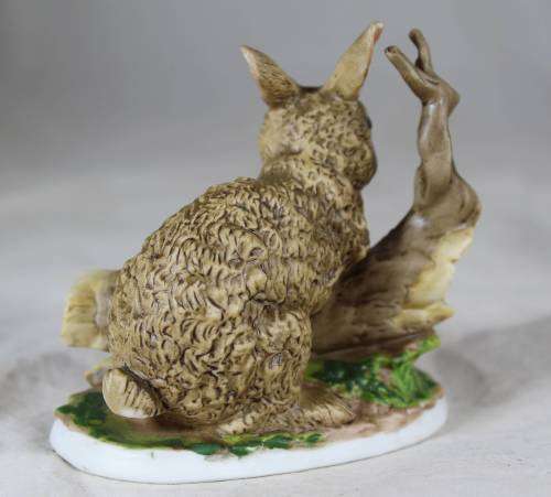Rabbit on a log figurine - Bid Now!!