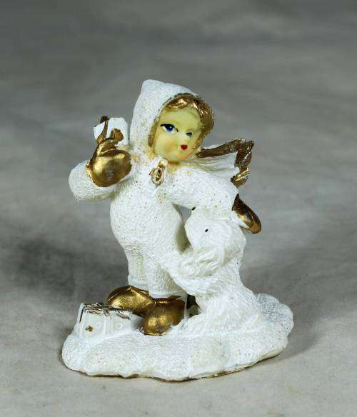 Angel with presents and a puppy