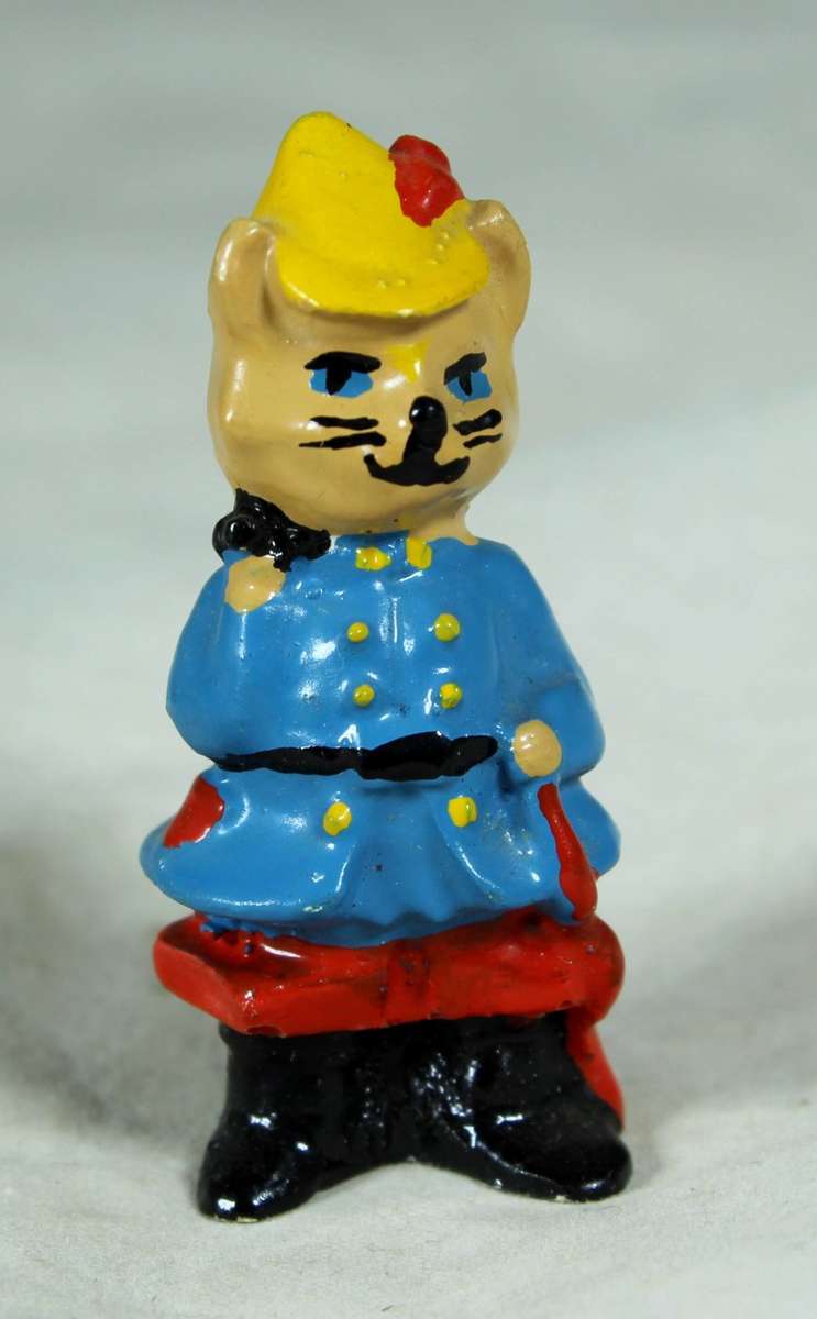 Miniature cat in uniform