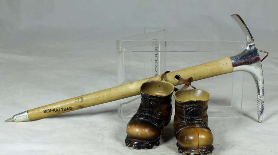 A  PICK WITH A PAIR OF PLASTIC BOOTS - BID NOW!!!