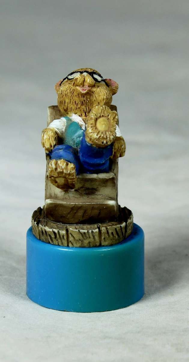 Miniature bear in a rocking chair