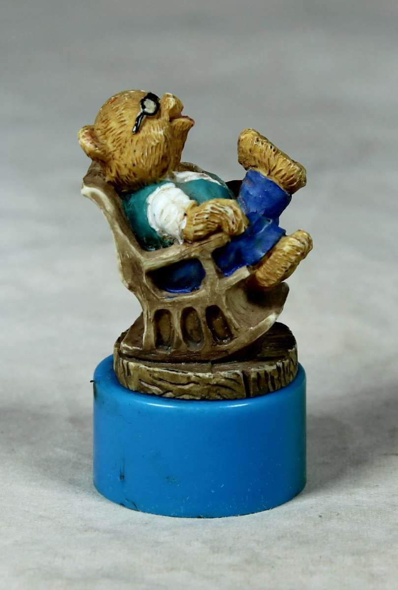 Miniature bear in a rocking chair