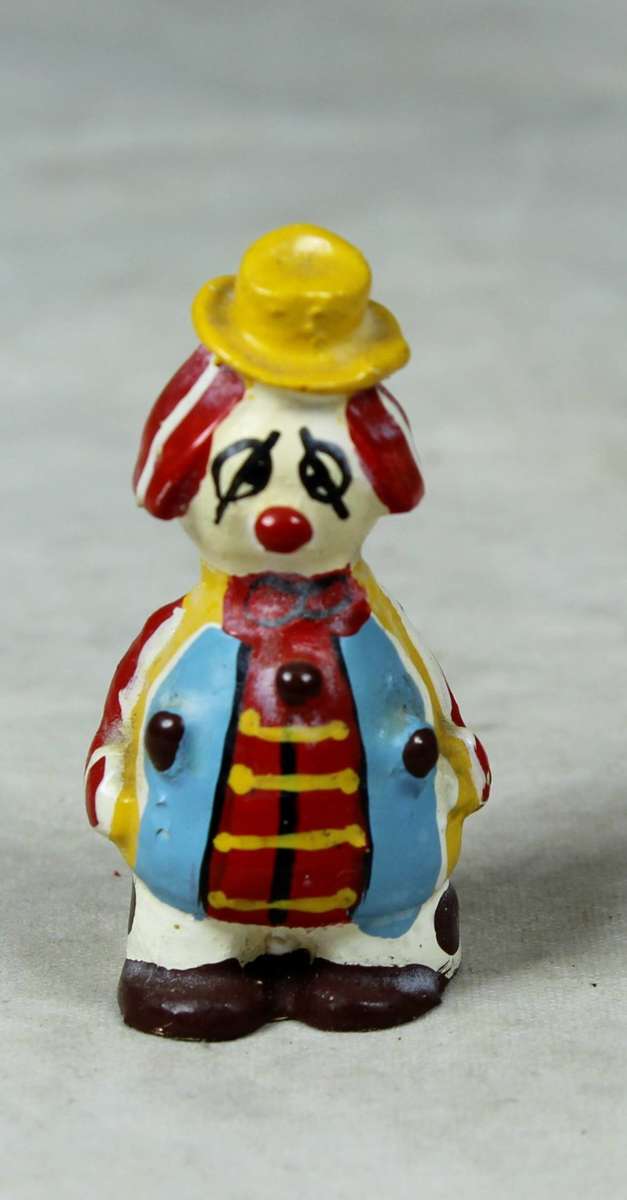 Miniature clown with a sad face