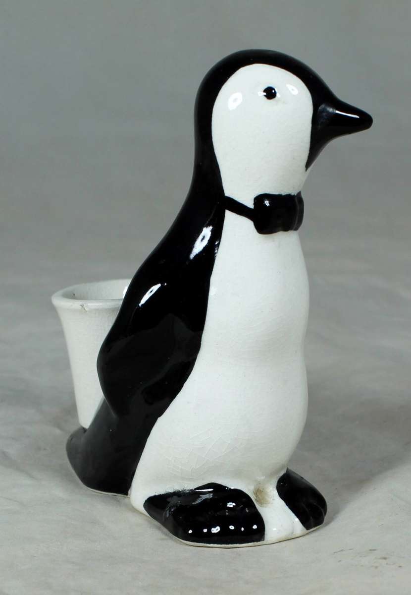 AN UNUSUAL PENGUIN TOOTHPICK HOLDER - BID NOW