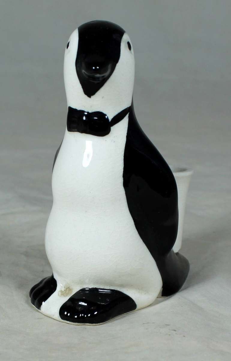 AN UNUSUAL PENGUIN TOOTHPICK HOLDER - BID NOW