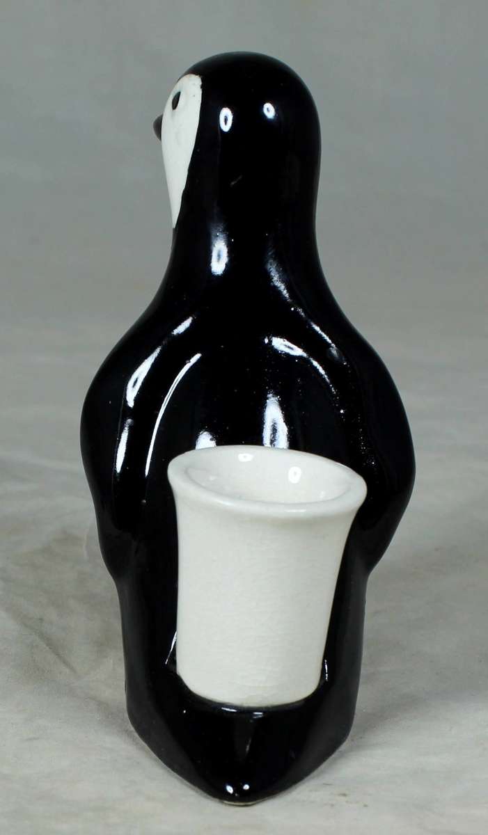 AN UNUSUAL PENGUIN TOOTHPICK HOLDER - BID NOW