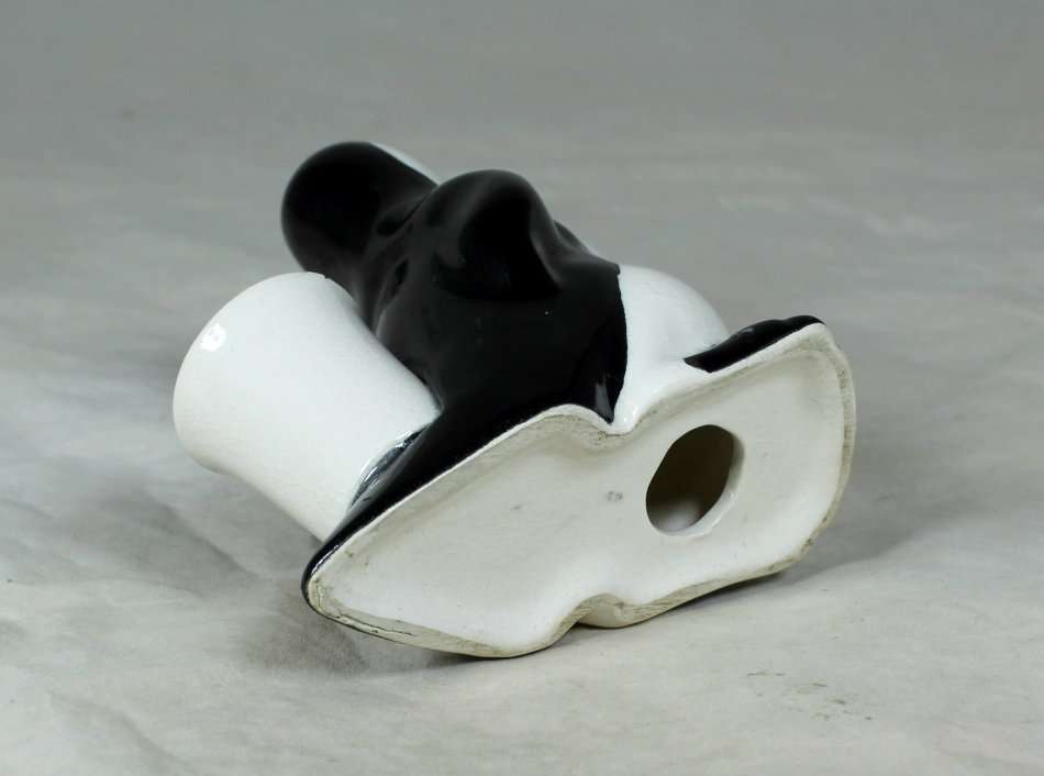 AN UNUSUAL PENGUIN TOOTHPICK HOLDER - BID NOW