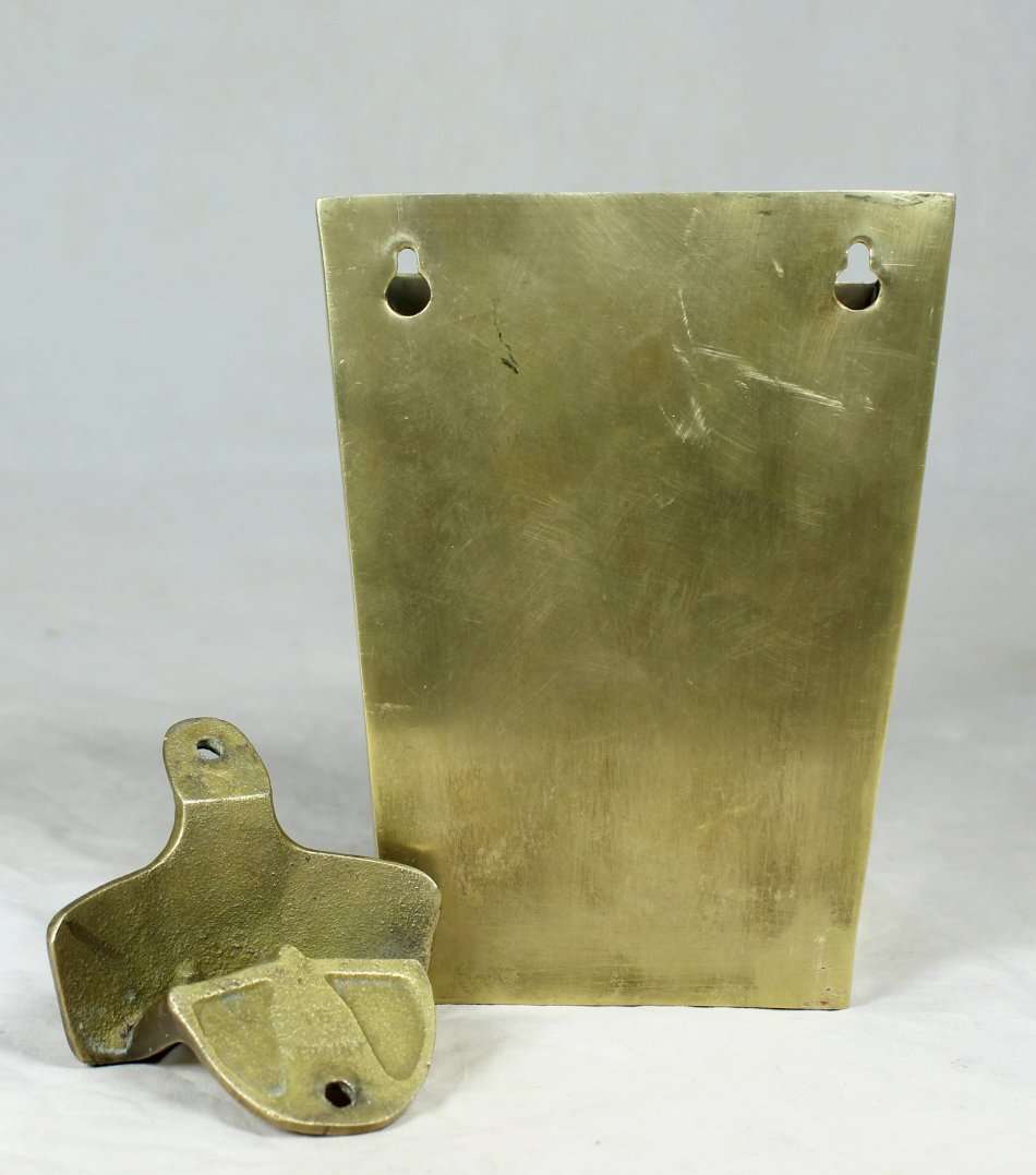 A VINTAGE BRASS COCA-COLA OPENER WITH ORIGINAL BOTTLE TOP CONTAINER - BID NOW!!!!