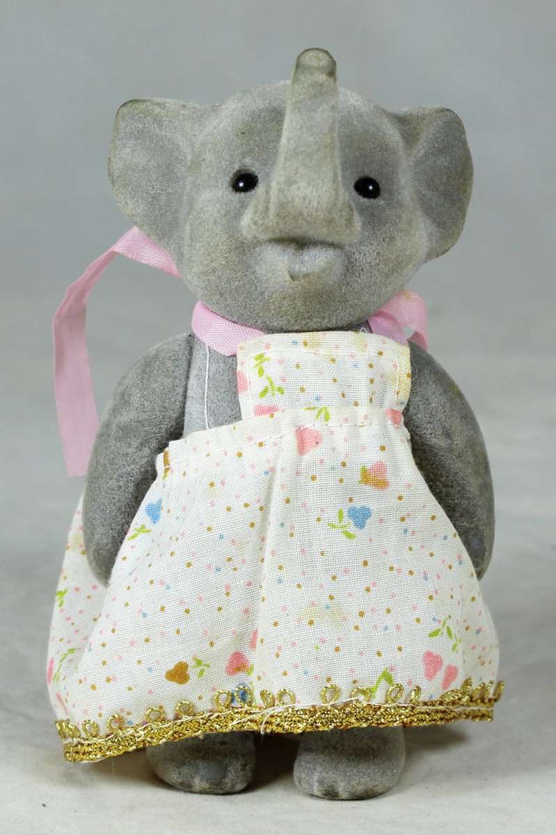 Small furry mother elephant