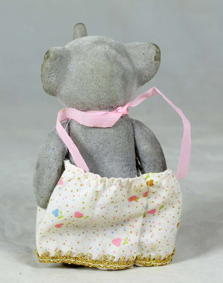 Small furry mother elephant