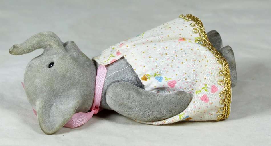 Small furry mother elephant