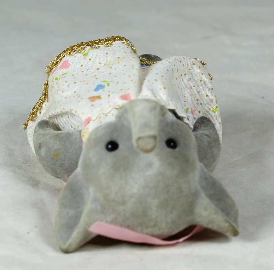 Small furry mother elephant