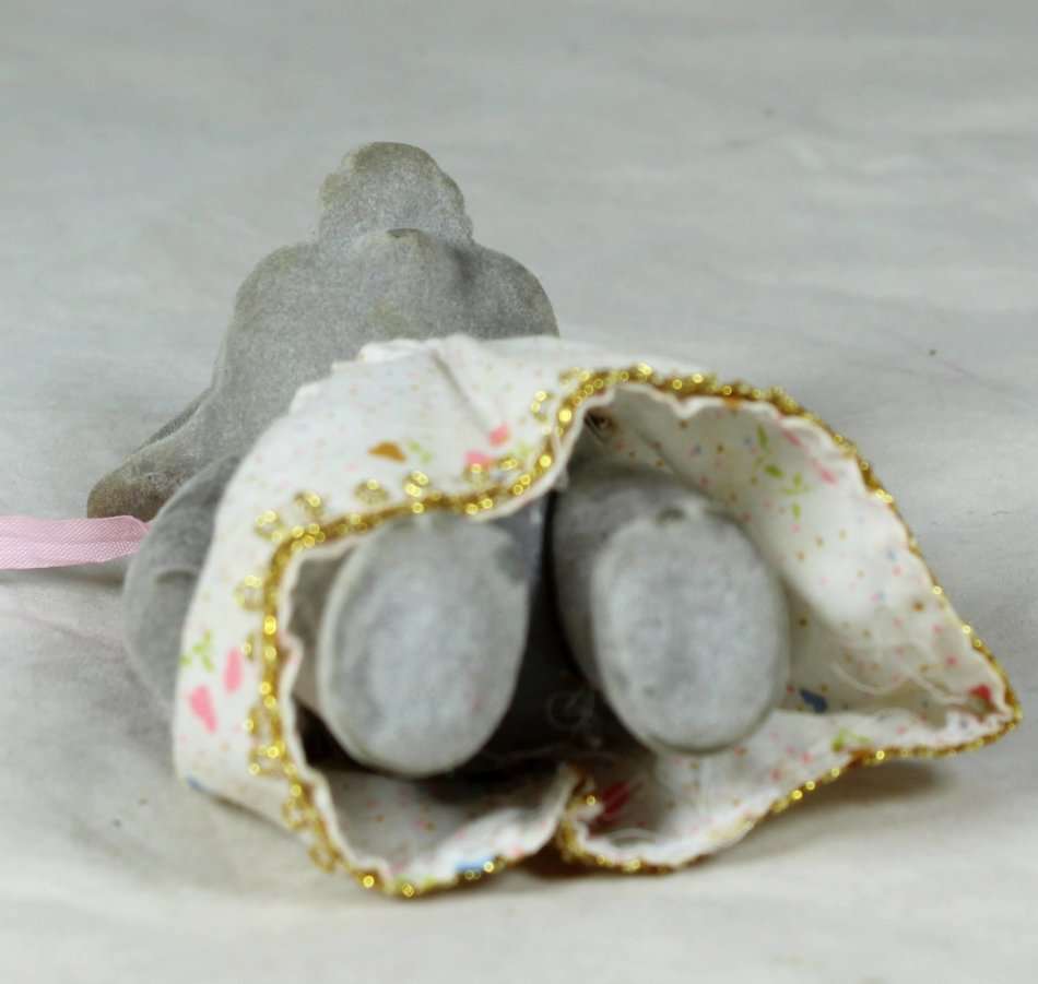 Small furry mother elephant