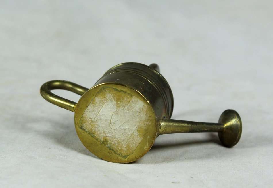 Miniature brass watering can