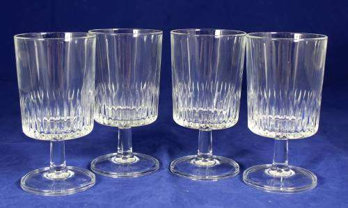 A SET OF FOUR CRYSTAL WINE GLASSES - BID NOW!!