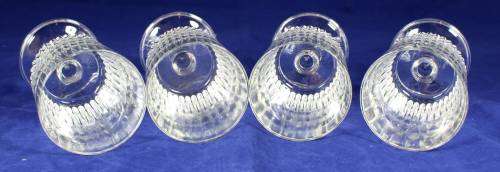 A SET OF FOUR CRYSTAL WINE GLASSES - BID NOW!!
