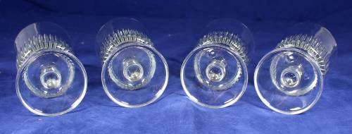 A SET OF FOUR CRYSTAL WINE GLASSES - BID NOW!!
