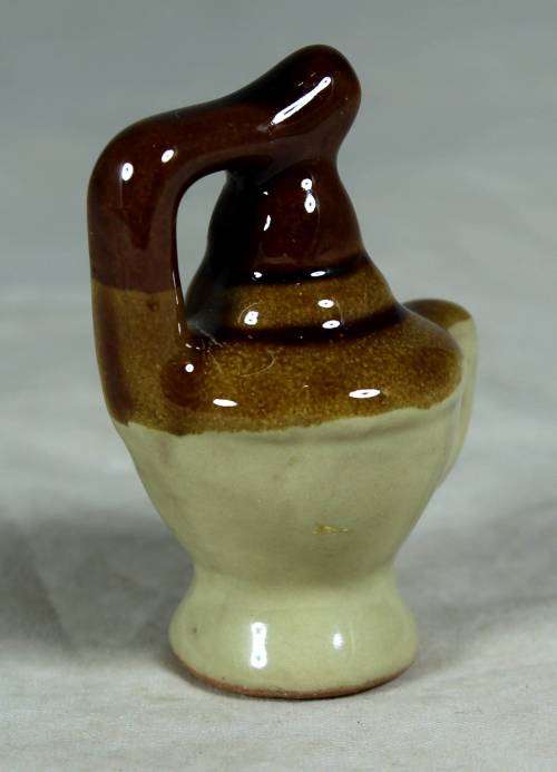 Miniature porcelain brown & beige water jug