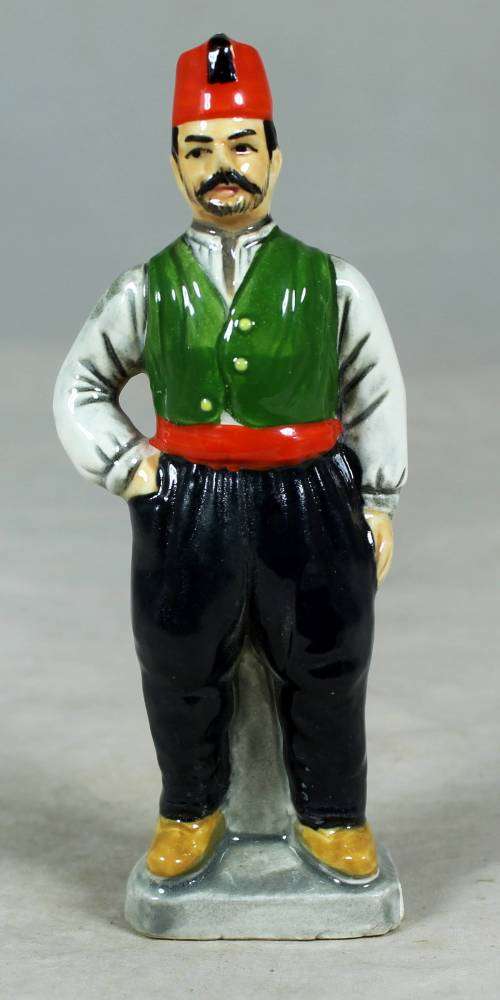 Vintage porcelain figurine - man in traditional clothes #58