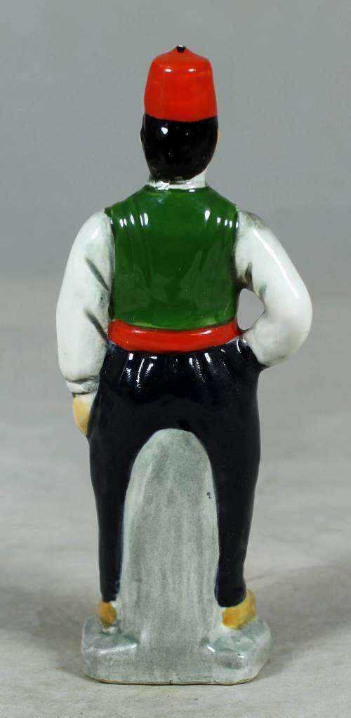 Vintage porcelain figurine - man in traditional clothes #58