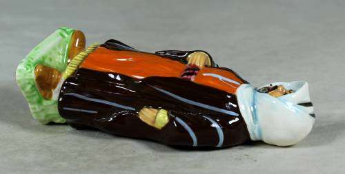 Vintage porcelain figurine - man in traditional clothes #60