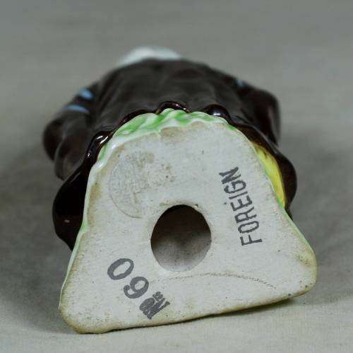 Vintage porcelain figurine - man in traditional clothes #60