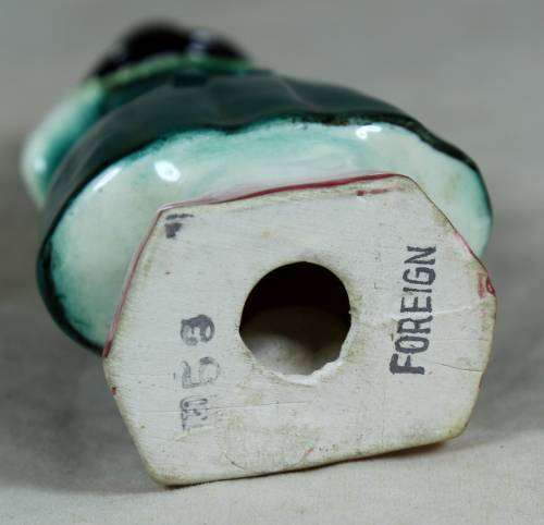 Vintage porcelain figurine - woman dressed in traditional clothes #53