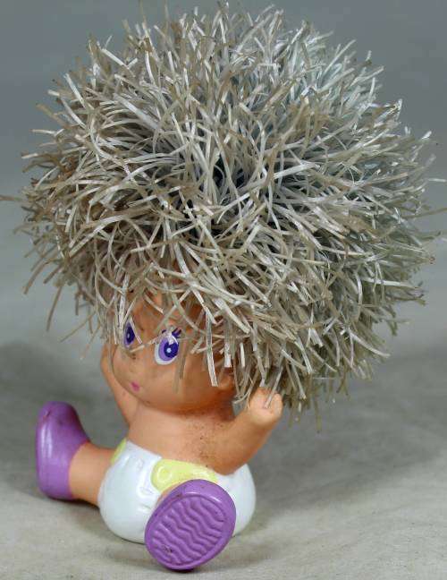 Rary dyper baby with large hair