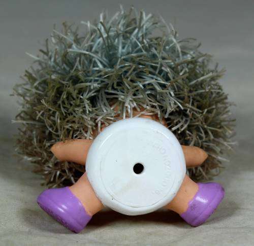 Rary dyper baby with large hair