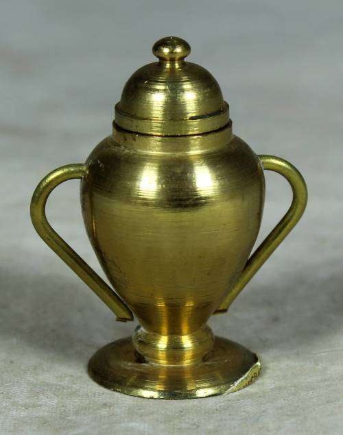 Miniature brass urn